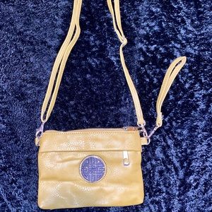 Brown hand bag with adjustable and optional straps